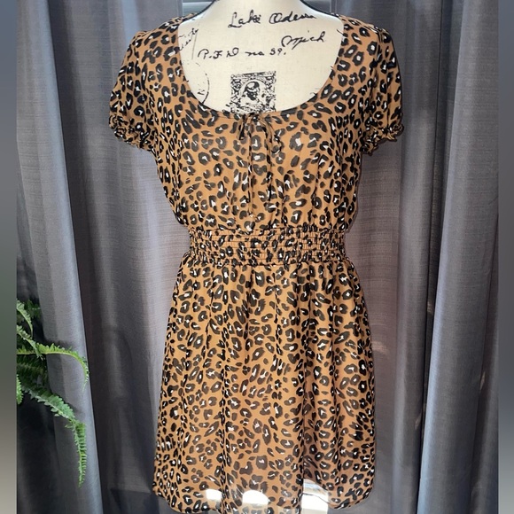 four clover Dresses & Skirts - Lovely light weight animal print dress never goes out of style…Size Large